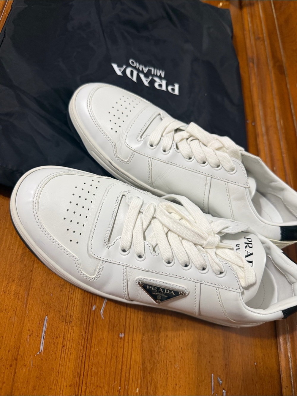 Prada White Leather Low-Top Sneakers with Black Heel Tab - Men